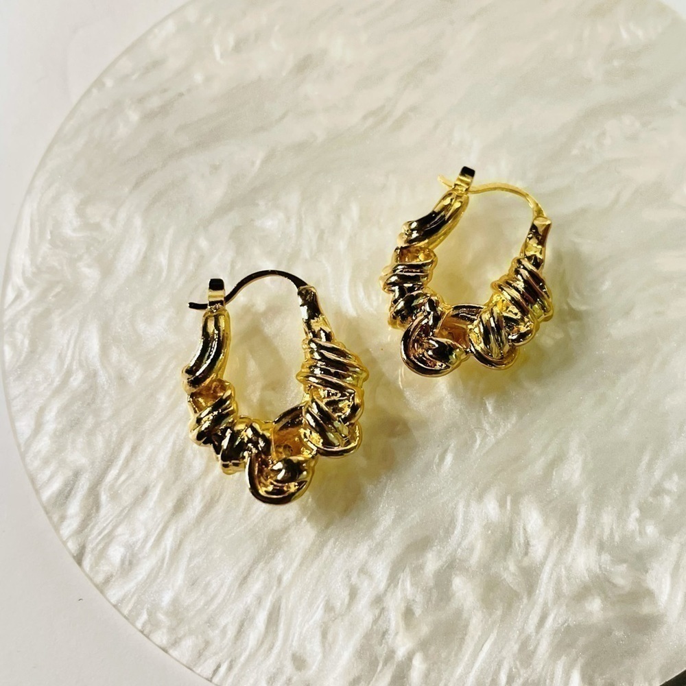 Gold knotted hoop earrings